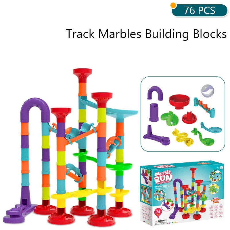 Kids building a marble run structure with interlocking blocks